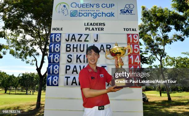 Jazz Janewattananond of Thailand pictured with the Queen's Cup winner's trophy after the final round of the Queen's Cup Presented By Bangchak at...