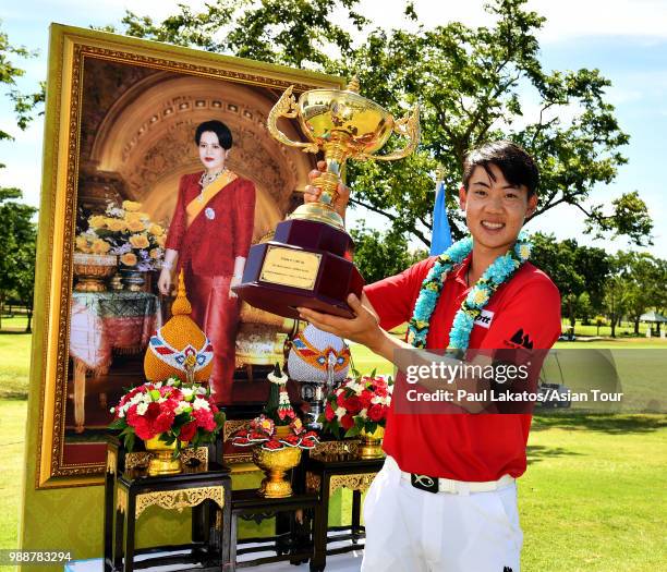 Jazz Janewattananond of Thailand pictured with the Queen's Cup winner's trophy after the final round of the Queen's Cup Presented By Bangchak at...