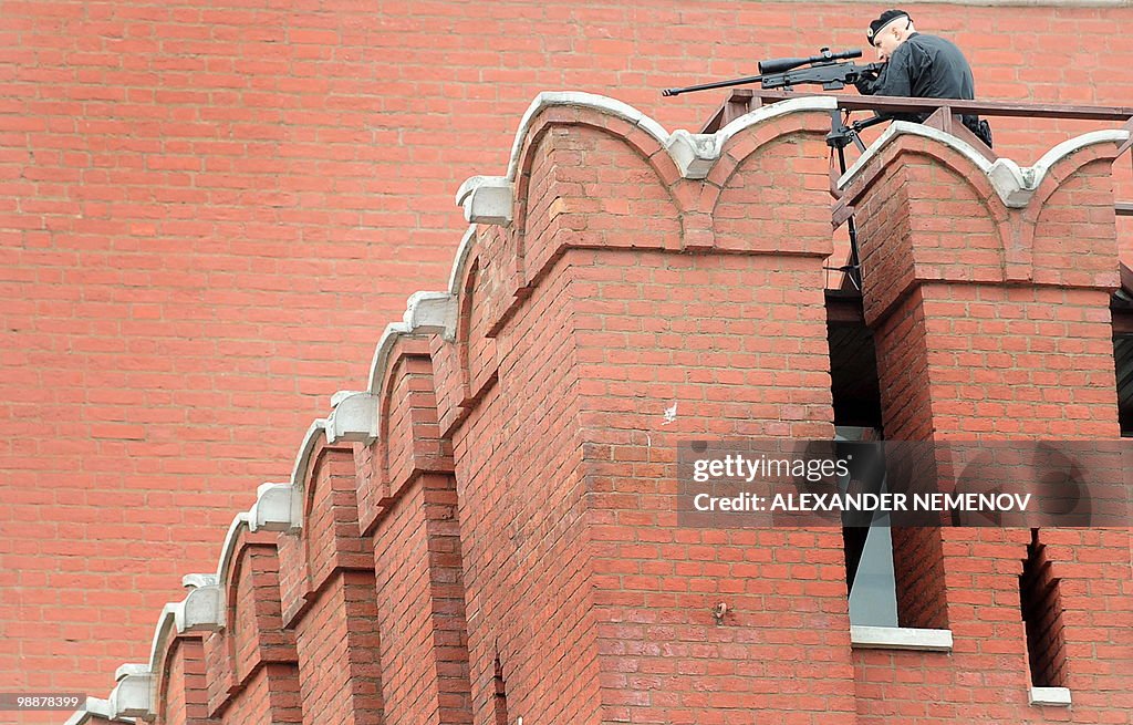 A Russian Security Services sniper keeps