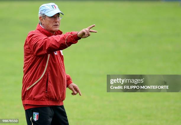 Italy's coach Marcello Lippi gestures during a training session of the italian national team on the outskirts of Rome on May 5, 2010. Italy will face...