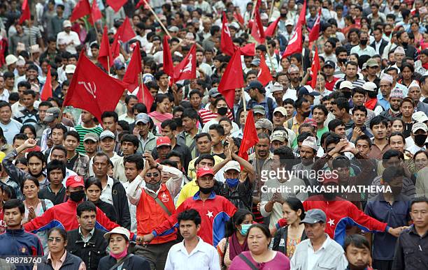 Unified Communist Party of Nepal supporters chant anti-goverment slogans during a rally on the fifth day of an indefinite nationwide strike in...