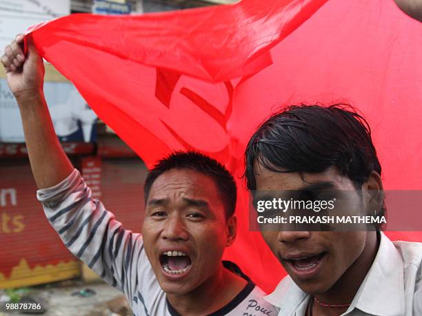 Unified Communist Party of Nepal supporters chant anti-goverment slogans during a rally on the fifth day of an indefinite nationwide strike in...