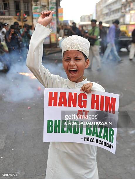 An Indian Muslim child shouts anti-Pakistani slogans during a rally celebrating the sentencing of Mohammed Ajmal Amir Kasab in Mumbai on May 6, 2010....
