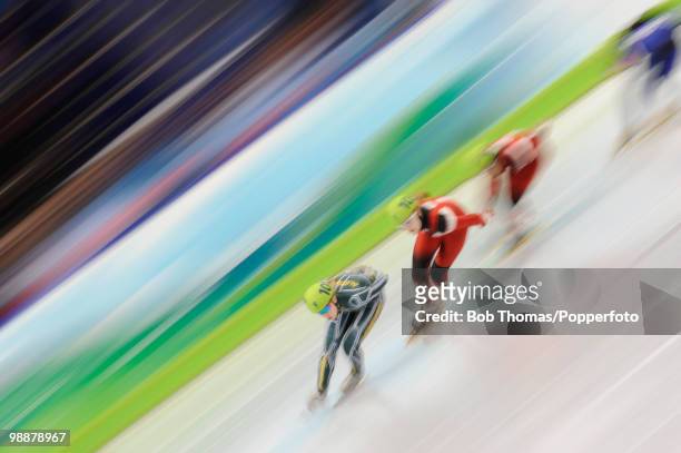 Motion blur action during the Ladies' 1000m Short Track Speed Skating on day 15 of the 2010 Vancouver Winter Olympics at Pacific Coliseum on February...