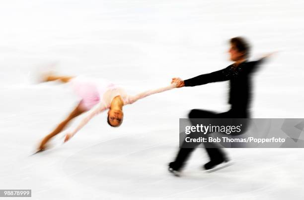 Motion blur action of competitors in the figure skating pairs short program on day 3 of the Vancouver 2010 Winter Olympics at Pacific Coliseum on...
