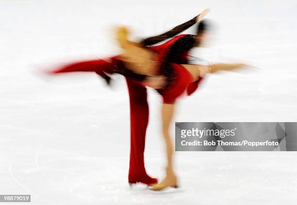 Motion blur action of competitors in the figure skating pairs short program on day 3 of the Vancouver 2010 Winter Olympics at Pacific Coliseum on...