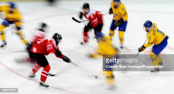 Motion blur action during the women's ice hockey preliminary game Sweden v Switzerland at UBC Thunderbird Arena on February 13, 2010 in Vancouver,...
