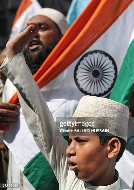 An Indian Muslim child shouts anti-Pakistani slogans during a rally celebrating the sentencing of Mohammed Ajmal Amir Kasab in Mumbai on May 6, 2010....