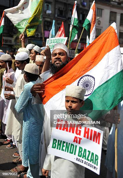 Indian Muslim's shouts anti-Pakistani slogans during a rally celebrating the sentencing of Mohammed Ajmal Amir Kasab in Mumbai on May 6, 2010. The...