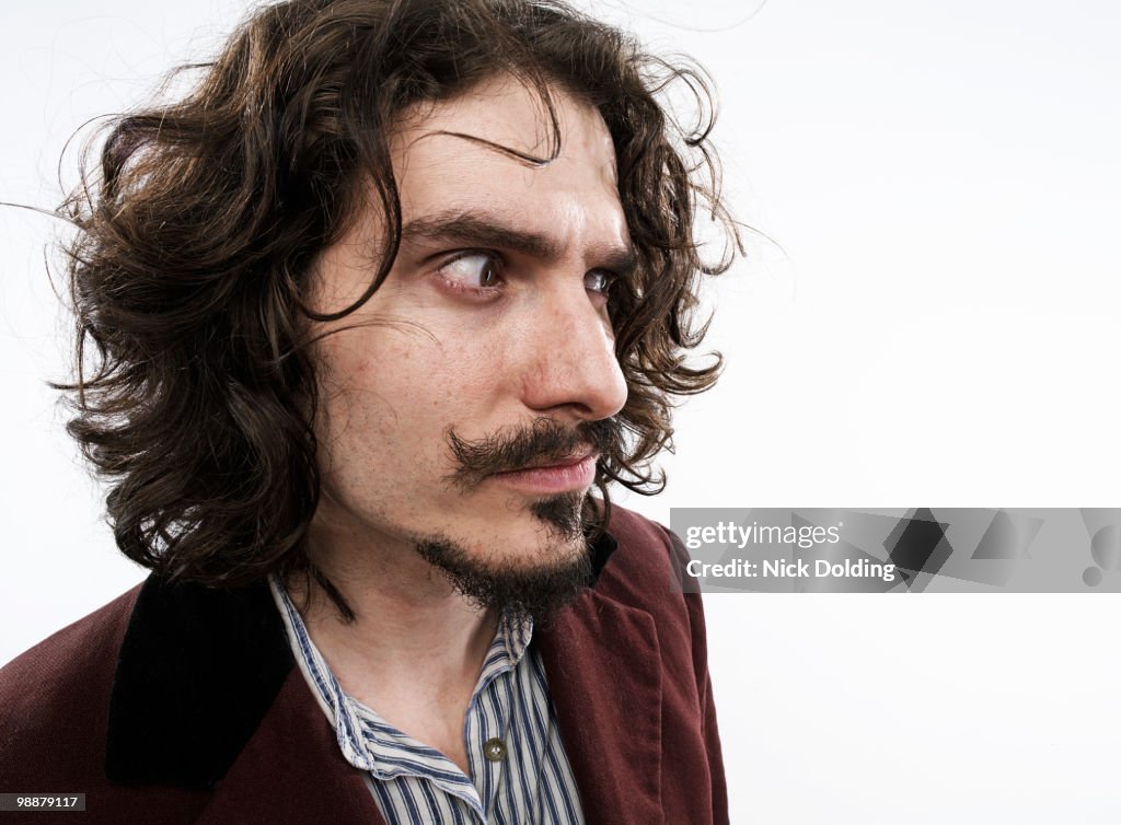 Crazed man with moustache