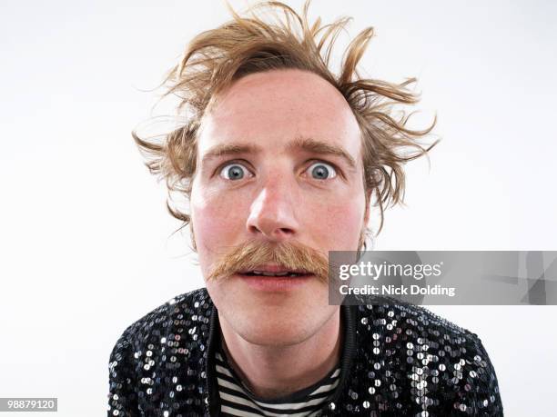 man in sequened jacket - man moustache stock pictures, royalty-free photos & images