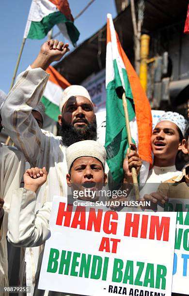 Indian Muslim's shout anti-Pakistani slogans during a rally celebrating the sentencing of Mohammed Ajmal Amir Kasab in Mumbai on May 6, 2010. The...