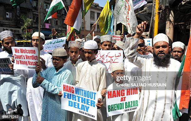 Indian Muslim's shout anti-Pakistani slogans during a rally celebrating the sentencing of Mohammed Ajmal Amir Kasab in Mumbai on May 6, 2010. The...