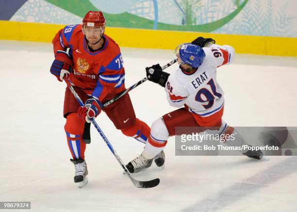 Andrei Markov of Russia with Martin Erat of the Czech Republic during the ice hockey men's preliminary game between Russia and the Czech Republic on...