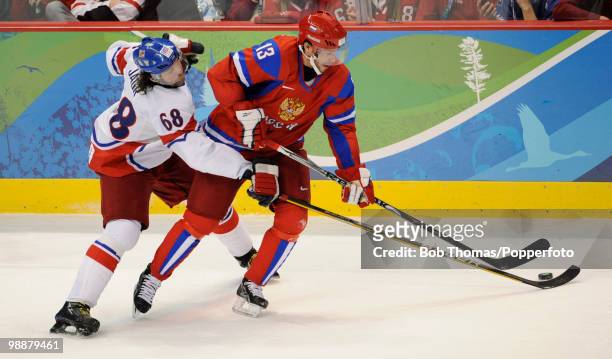 Pavel Datsyuk of Russia with Jaromir Jagr of the Czech Republic during the ice hockey men's preliminary game between Russia and the Czech Republic on...