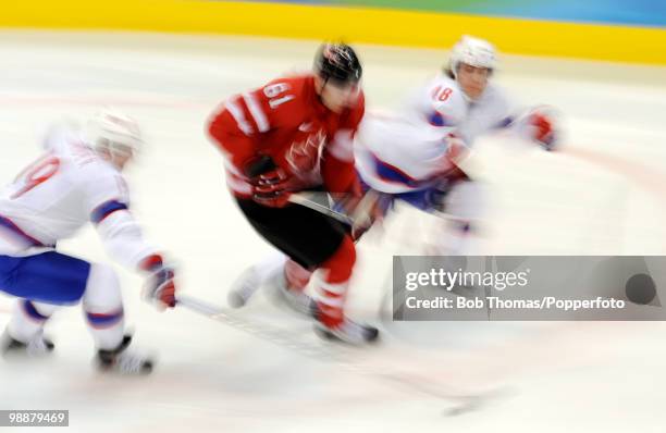 Motion blur action during the Canada v Norway ice hockey men's preliminary game on day 5 of the Vancouver 2010 Winter Olympics at Canada Hockey Place...