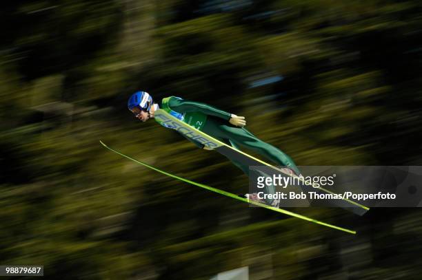 Andreas Kofler of Austria competes in the men's ski jumping team event on day 11 of the 2010 Vancouver Winter Olympics at Whistler Olympic Park Ski...