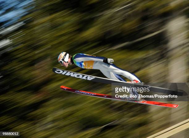 Taylor Fletcher of the USA competes in the men's ski jumping team event on day 11 of the 2010 Vancouver Winter Olympics at Whistler Olympic Park Ski...