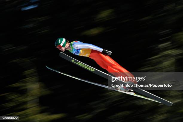 Iija Rosliakov of Russia competes in the men's ski jumping team event on day 11 of the 2010 Vancouver Winter Olympics at Whistler Olympic Park Ski...