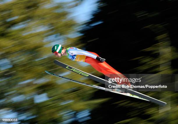 Iija Rosliakov of Russia competes in the men's ski jumping team event on day 11 of the 2010 Vancouver Winter Olympics at Whistler Olympic Park Ski...