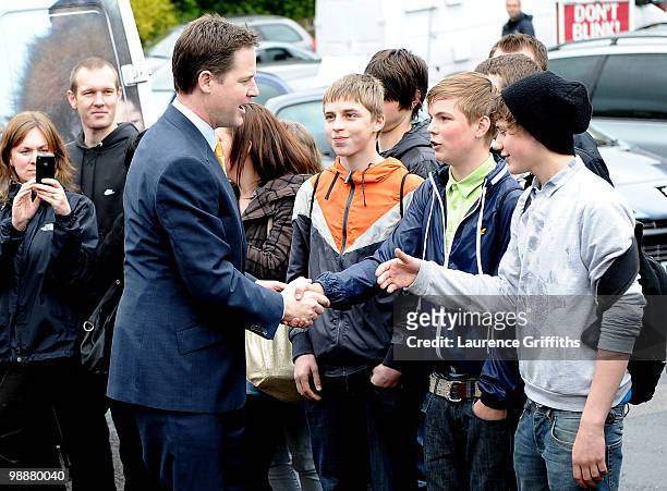 Liberal Democrat Leader Nick Clegg meets young supporters before casting his vote at Bents Green Methodist Church on May 6, 2010 in Sheffield,...