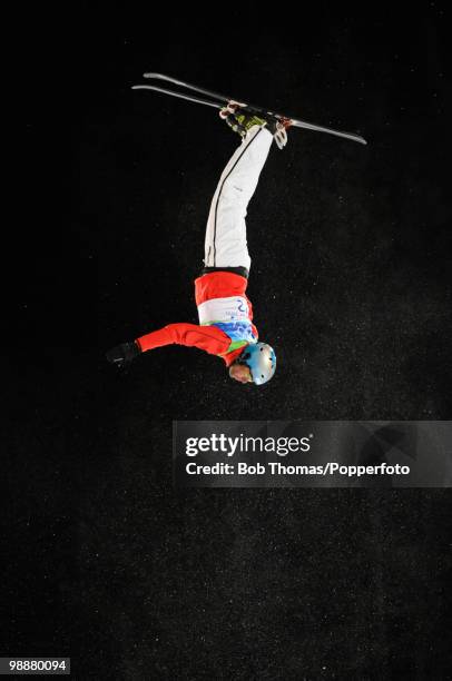 Andreas Isoz of Switzerland competes during the freestyle skiing men's aerials qualification on day 11 of the Vancouver 2010 Winter Olympics at...