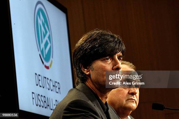 Joachim Loew , head coach of the German national football team, and Harald Stenger, press officer of the German Football Association DFB pause before...