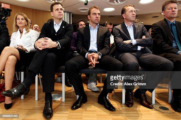 Manager Oliver Bierhoff, assistant coach Hans-Dieter Flick and goalkeeper coach Andreas Koepcke of the German national football team, attend a press...