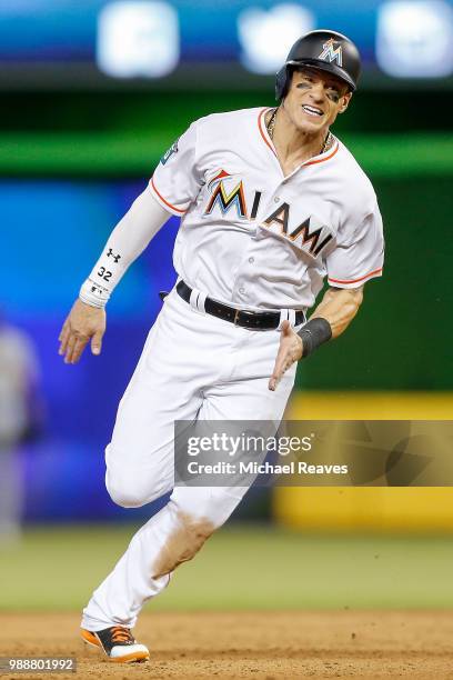 Derek Dietrich of the Miami Marlins in action against the Miami Marlins at Marlins Park on June 14, 2018 in Miami, Florida.