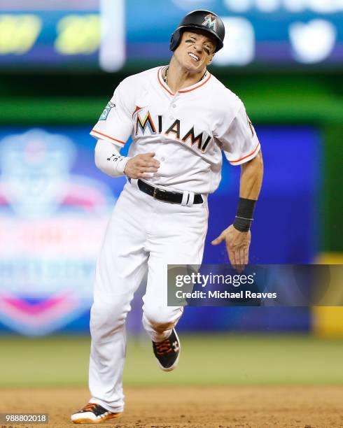 Derek Dietrich of the Miami Marlins in action against the Miami Marlins at Marlins Park on June 14, 2018 in Miami, Florida.