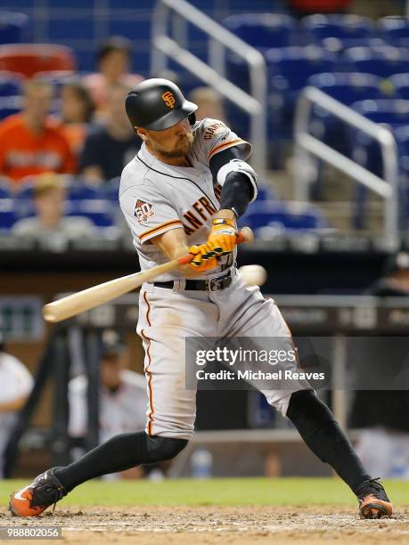 Hunter Pence of the San Francisco Giants in action against the Miami Marlins at Marlins Park on June 14, 2018 in Miami, Florida.