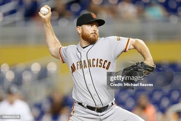 Sam Dyson of the San Francisco Giants delivers a pitch against the Miami Marlins at Marlins Park on June 14, 2018 in Miami, Florida.