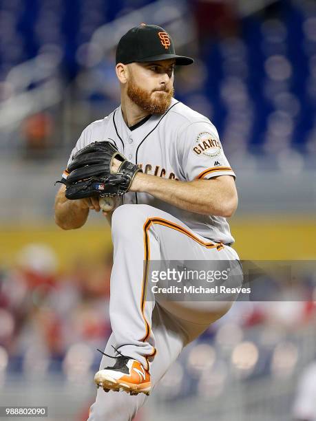 Sam Dyson of the San Francisco Giants delivers a pitch against the Miami Marlins at Marlins Park on June 14, 2018 in Miami, Florida.