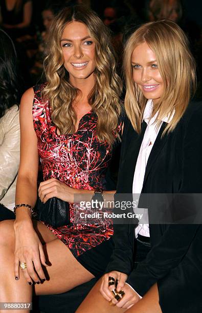 Models Jennifer Hawkins and Lara Bingle attend the front row of the Fernando Frisoni collection show on the fourth day of Rosemount Australian...