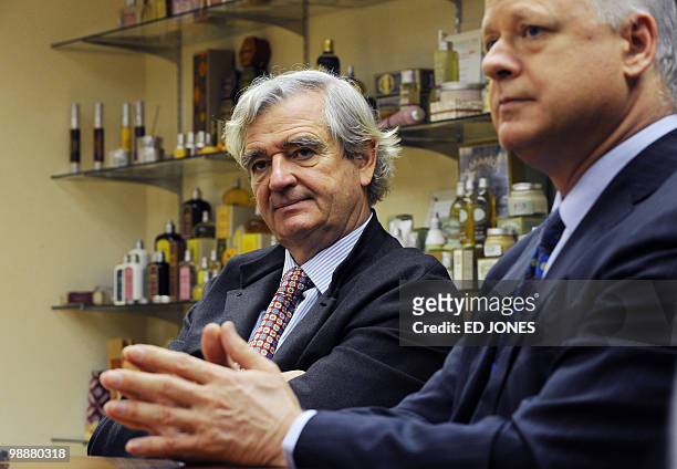 Reinold Geiger , president of French cosmetics group L'Occitane, and the group's Asia-Pacific president Andre Hoffmann , attend a group briefing at...