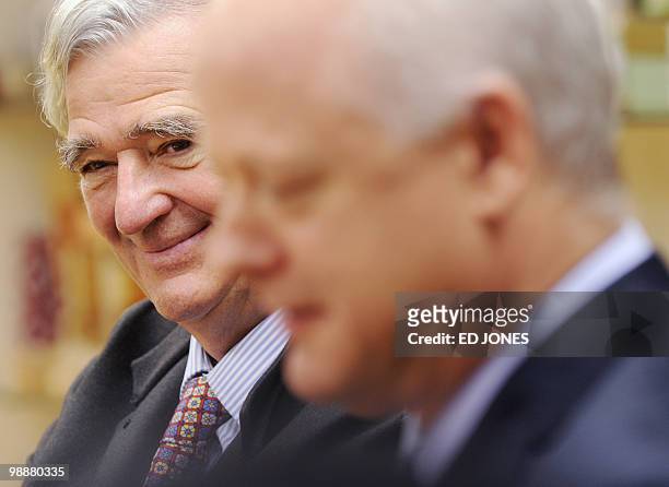 Reinold Geiger , president of French cosmetics group L'Occitane, and the group's Asia-Pacific president Andre Hoffmann, attend a group briefing at...