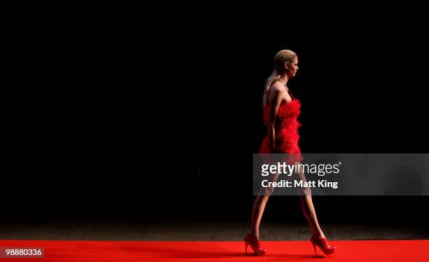 Model prepares ahead of the Fernando Frisoni collection show on the fourth day of Rosemount Australian Fashion Week Spring/Summer 2010/11 at the...