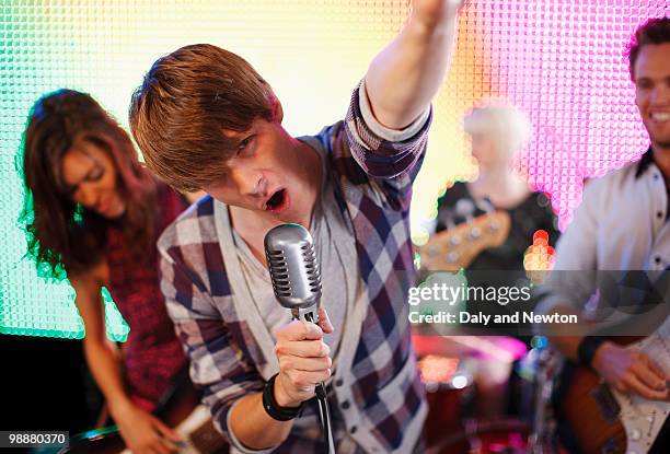 rock band performing on stage - chemistry band stock pictures, royalty-free photos & images