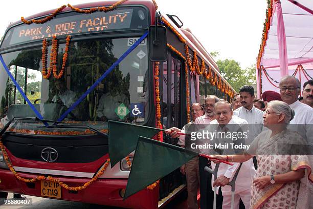 Union Minister of Urban Development S Jaipal Reddy and Delhi Chief Minister Sheila Dikshit flagging off the Park & Ride bus service for the benefit...