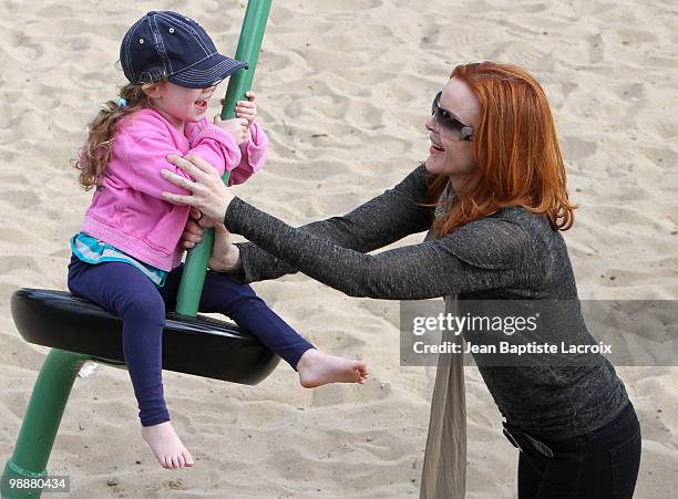 Marcia Cross, Eden and Savannah are seen at the park in Santa Monica on April 23, 2010 in Los Angeles, California.