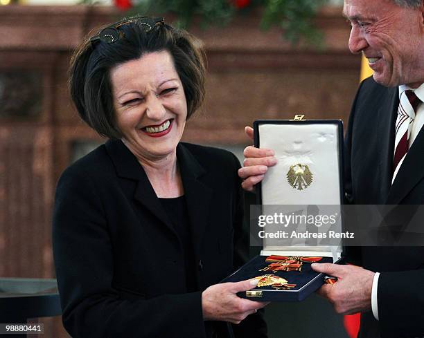 German writer Herta Mueller receives the Federal cross of Merit by German President Horst Koehler at Bellevue palace on May 6, 2010 in Berlin,...