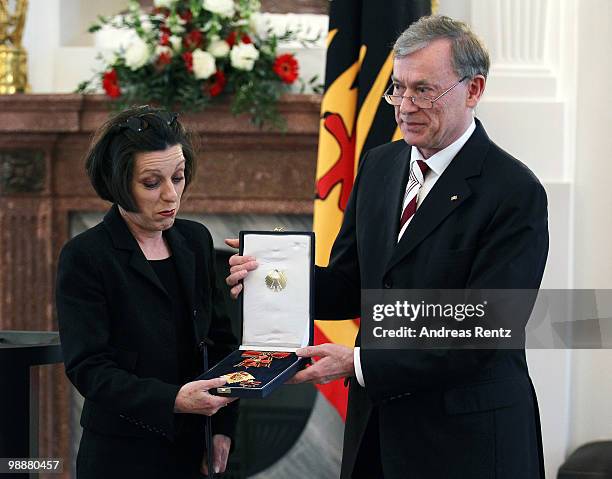 German writer Herta Mueller receives the Federal cross of Merit by German President Horst Koehler at Bellevue palace on May 6, 2010 in Berlin,...