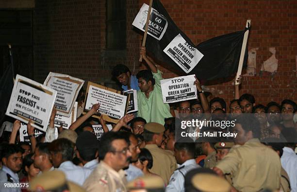 Students protest during Home Minister P Chidambaram's visit to the Jawahar Lal Nehru University campus in New Delhi on May 5, 2010. Chidambaram was...