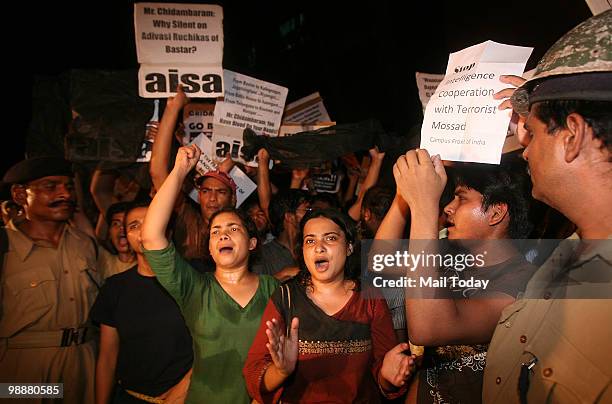 Students protest during Home Minister P Chidambaram's visit to the Jawahar Lal Nehru University campus in New Delhi on May 5, 2010. Chidambaram was...