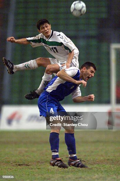 Kutibayev Nagmetulla of Uzbekistan in an aerial duo with Almin Kulenovic of Bosnia & Herzegovina during the final of the 37th Merdeka Tournament at...