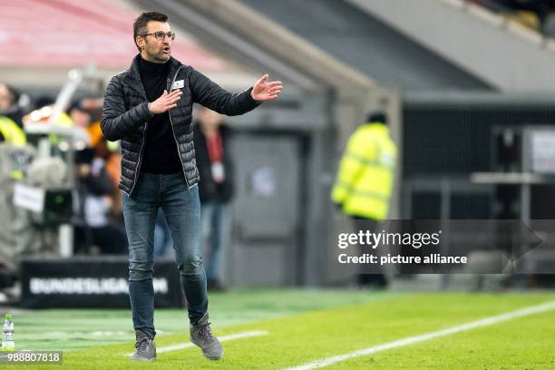 Nuremberg head coach Michael Kollner gesturing from the sidelines during the German 2nd Bundesliga soccer match between Fortuna Dusseldorf and 1. FC...