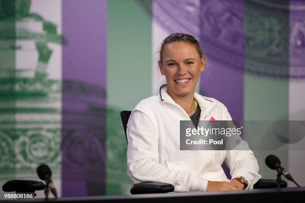 Caroline Wozniacki attends a press conference ahead of the Wimbledon Lawn Tennis Championships at the All England Lawn Tennis and Croquet Club at...