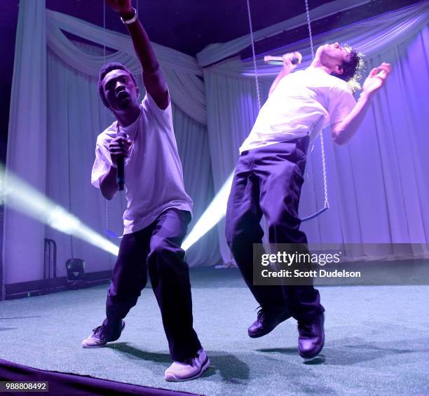 Singers Merlyn Wood and Matt Champion of the hip hop collective Brockhampton perform onstage during the Agenda Festival on June 30, 2018 in Long...