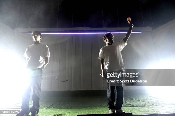 Singer Matt Champion and Kevin Abstract of the hip hop collective Brockhampton perform onstage during the Agenda Festival on June 30, 2018 in Long...