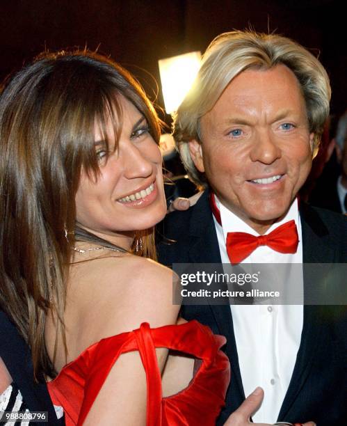 The fashion entrepreneur Otto Kern and his then-wife Dana pose together at the 21st Opern ball in Frankfurt am Main, Germany, 22 February 2003. The...